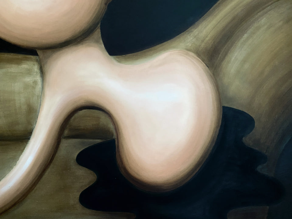 Female lying on chaise longue